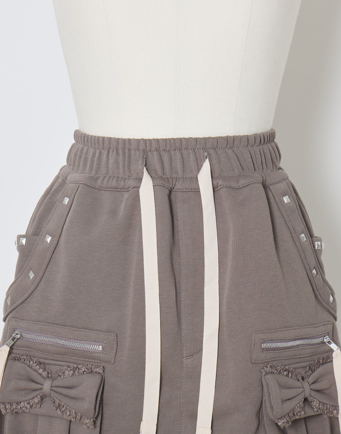 スカート Ribbon pocket studded sweat skirt Ribbon pocket studded sweat skirt – AVENCHUMU （アバンチュウム）